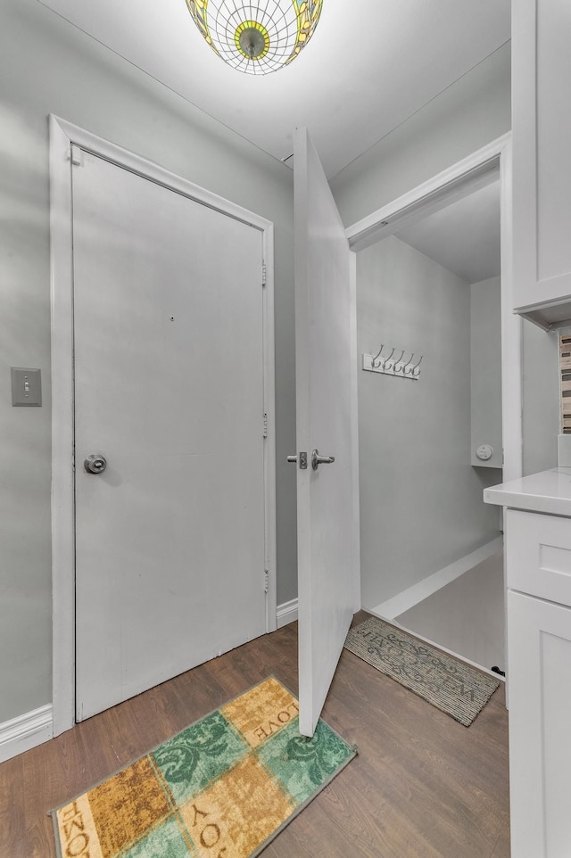 foyer with wood finished floors