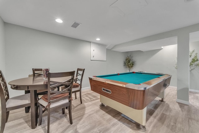 recreation room with visible vents, baseboards, and light wood-style floors