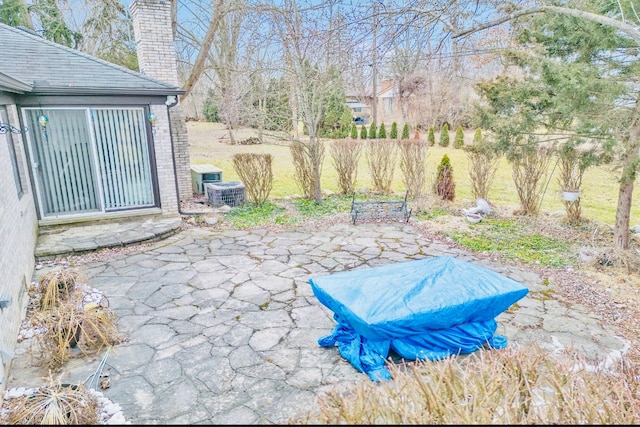 view of patio featuring cooling unit