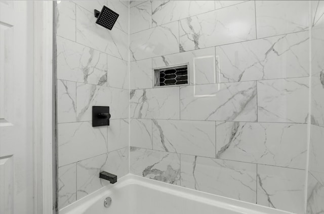 bathroom featuring bathing tub / shower combination