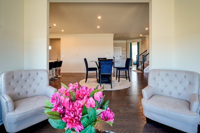 living area featuring dark wood finished floors, recessed lighting, stairs, and baseboards