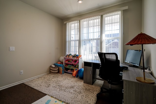 office featuring wood finished floors and baseboards