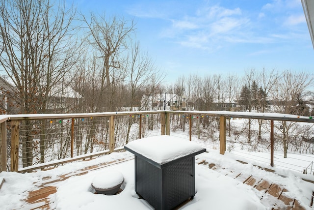 view of snow covered deck