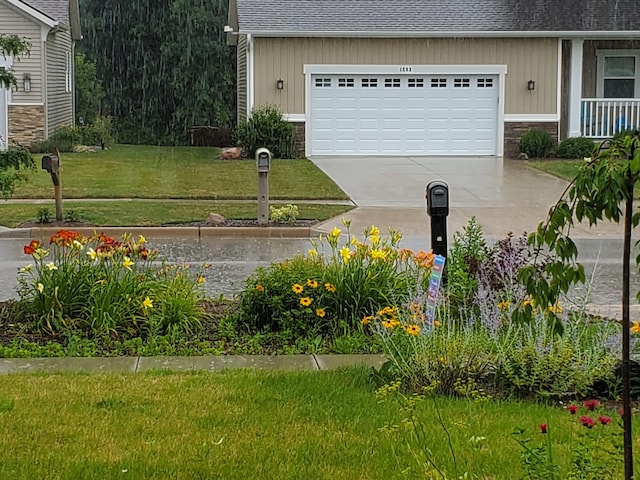 garage with concrete driveway