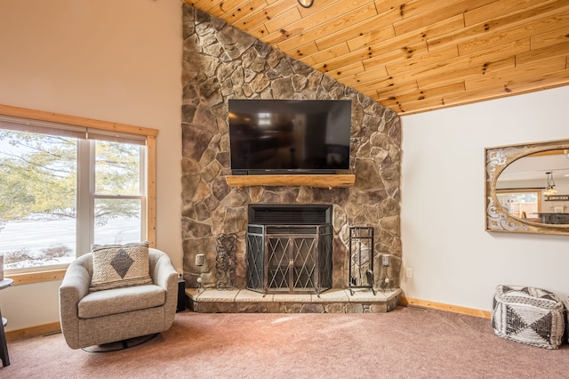 living area with baseboards, carpet, wooden ceiling, and vaulted ceiling