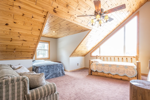 bedroom featuring baseboards, carpet floors, wood ceiling, and vaulted ceiling