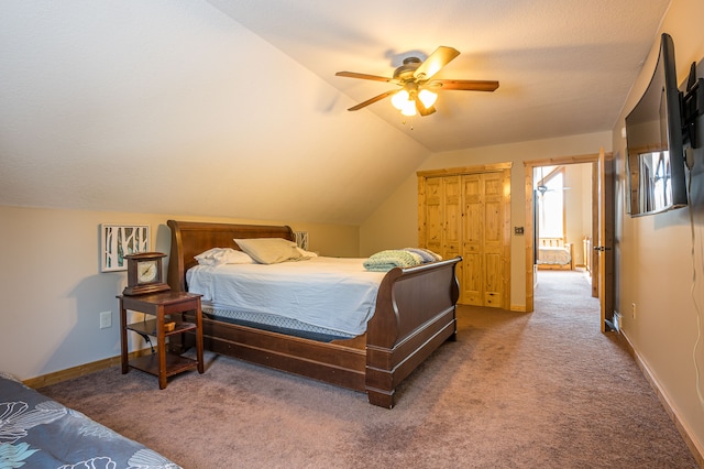 bedroom featuring baseboards, carpet, lofted ceiling, and a ceiling fan