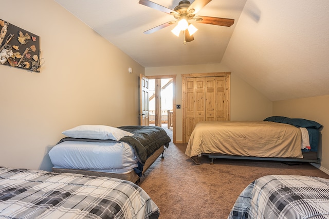 carpeted bedroom with baseboards, lofted ceiling, and a ceiling fan