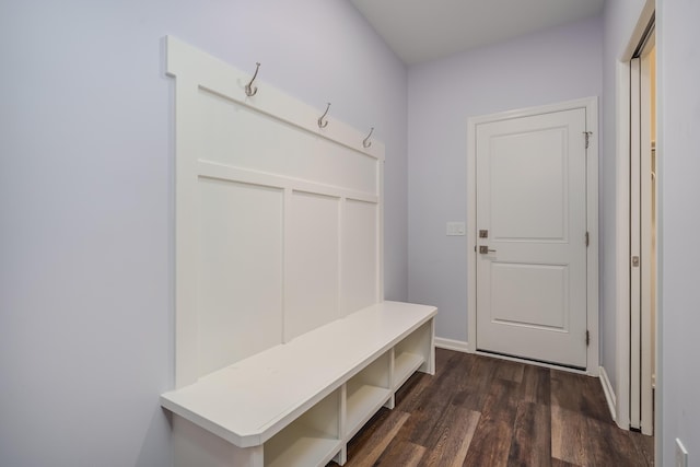 mudroom with dark wood-style flooring