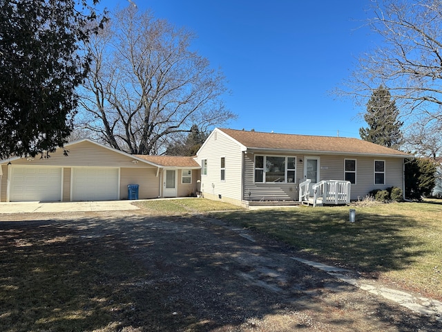 ranch-style house featuring a garage, a front yard, and dirt driveway