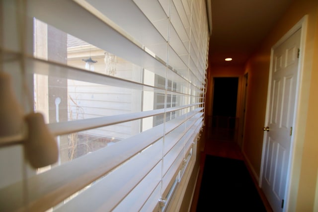 hall with recessed lighting