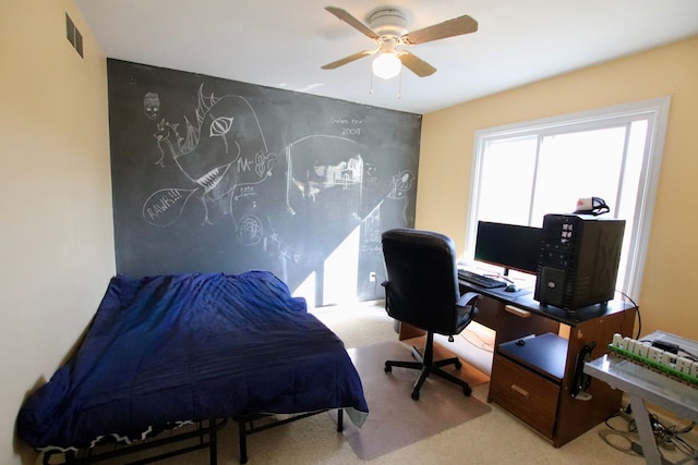 bedroom featuring a ceiling fan, carpet, and visible vents