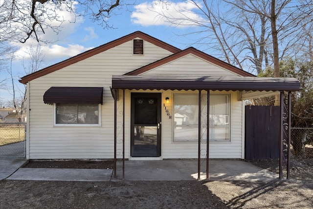 view of front of house with fence