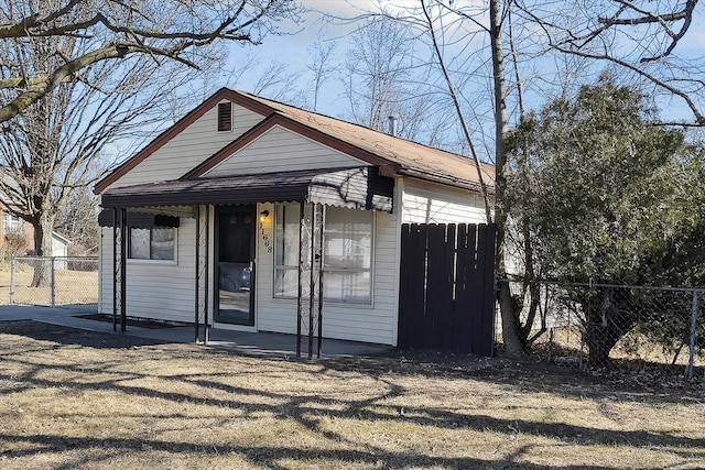 view of front of home with fence