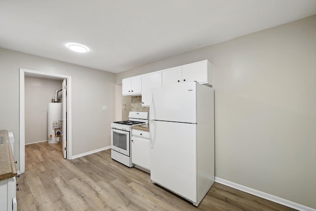 kitchen with gas water heater, light wood-style flooring, white cabinets, white appliances, and baseboards