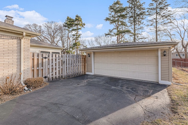 detached garage with fence