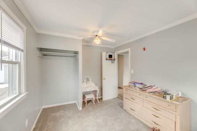 bedroom with light carpet, a closet, and crown molding