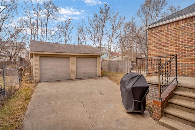 detached garage with fence