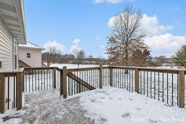 view of snow covered deck