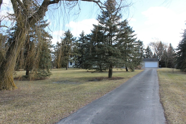 view of street featuring driveway