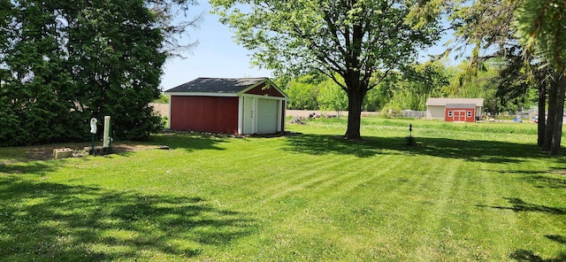 view of yard with a shed and an outdoor structure