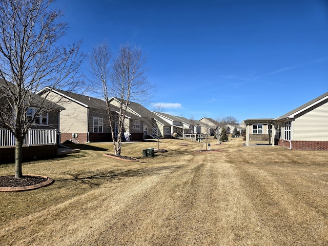 view of yard with a residential view