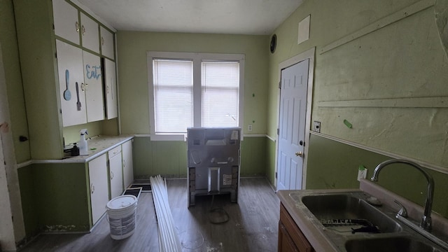77 Irwin Ave, Muskegon, MI 49442 - bathroom featuring a sink and wood finished floors