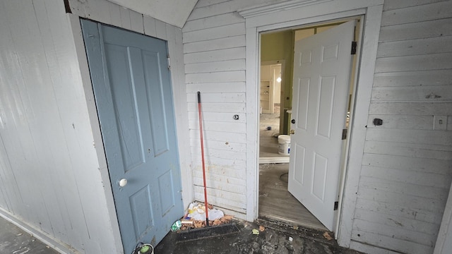 77 Irwin Ave, Muskegon, MI 49442 - hall with wood walls and lofted ceiling