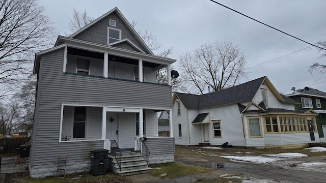 view of front of property featuring a sunroom