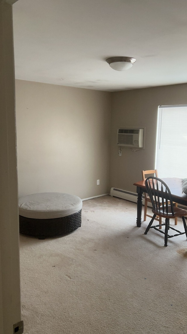 interior space with a wall mounted AC and baseboard heating