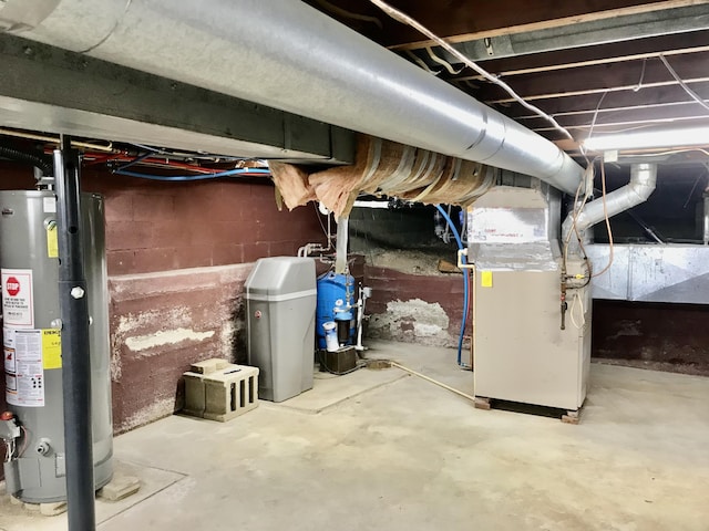 unfinished below grade area with gas water heater and heating unit