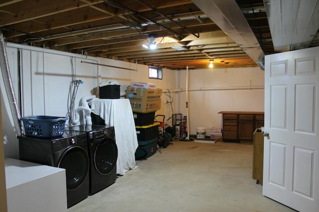 below grade area featuring separate washer and dryer