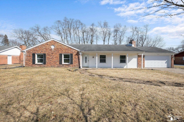 ranch-style house featuring brick siding, a front lawn, a chimney, and a garage