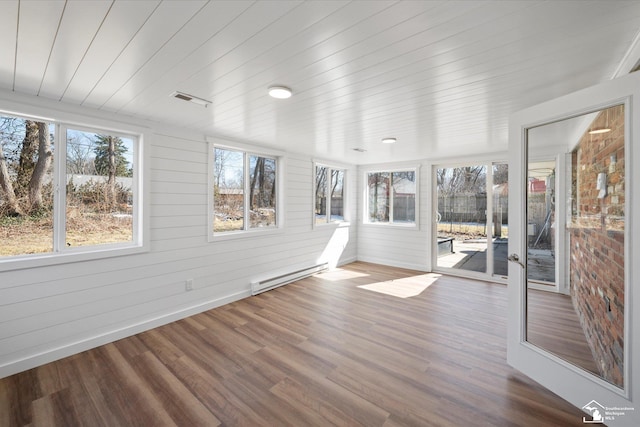 unfurnished sunroom featuring wooden ceiling, a baseboard radiator, and visible vents