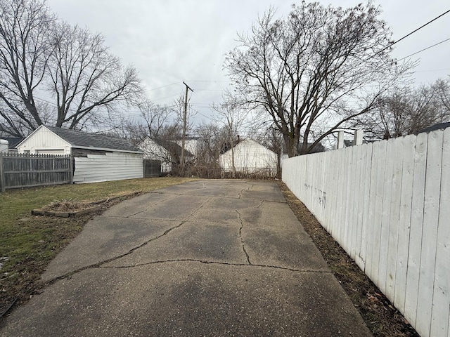 view of road with aphalt driveway