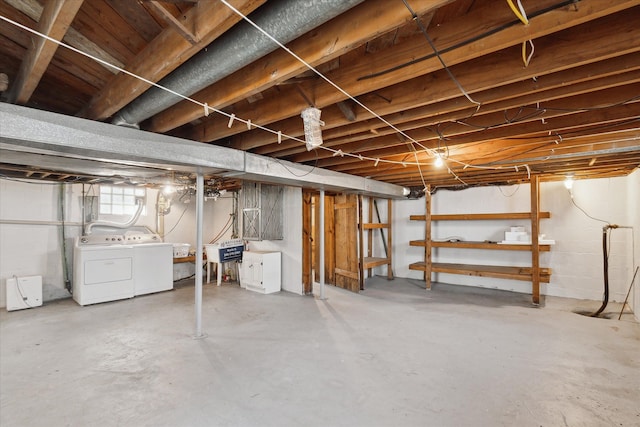 basement with washing machine and dryer