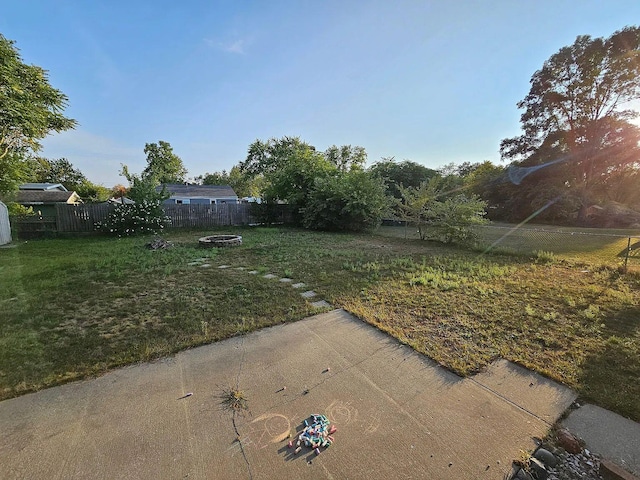 view of yard with a fenced backyard