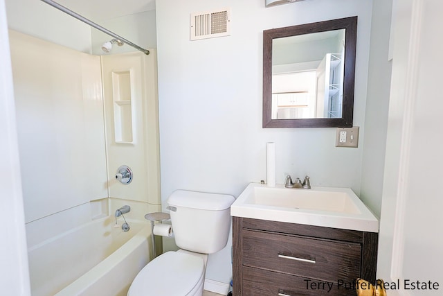 bathroom with vanity, toilet, washtub / shower combination, and visible vents