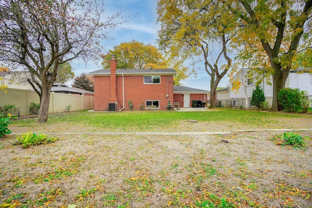 rear view of property featuring central AC unit, a patio, a fenced backyard, a chimney, and brick siding