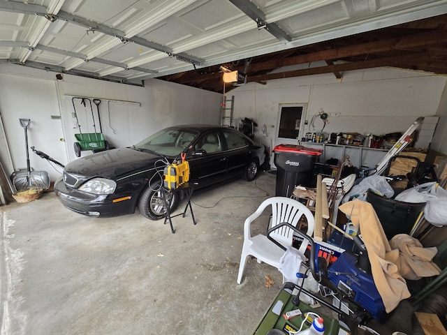 garage featuring a garage door opener