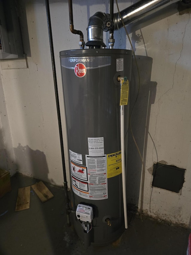 utility room featuring gas water heater