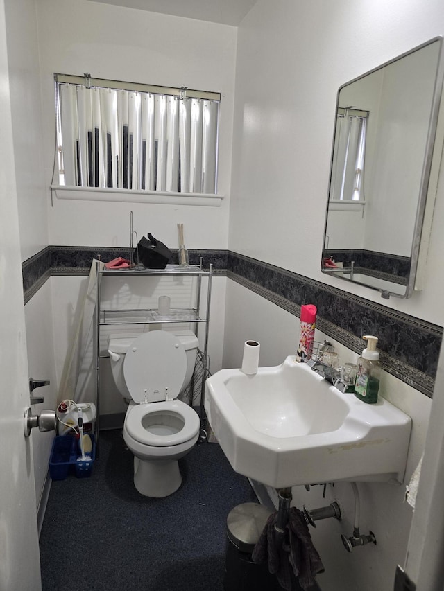 bathroom featuring toilet