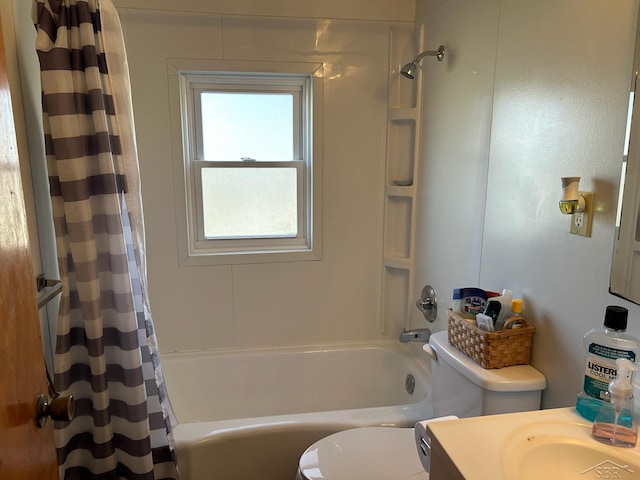 full bathroom featuring toilet, shower / bath combo, and vanity