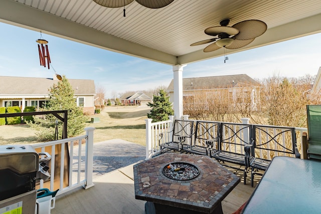 view of patio / terrace with a grill and ceiling fan