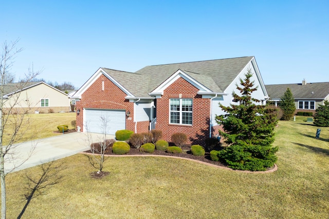 view of front of house with a front yard, brick siding, and driveway