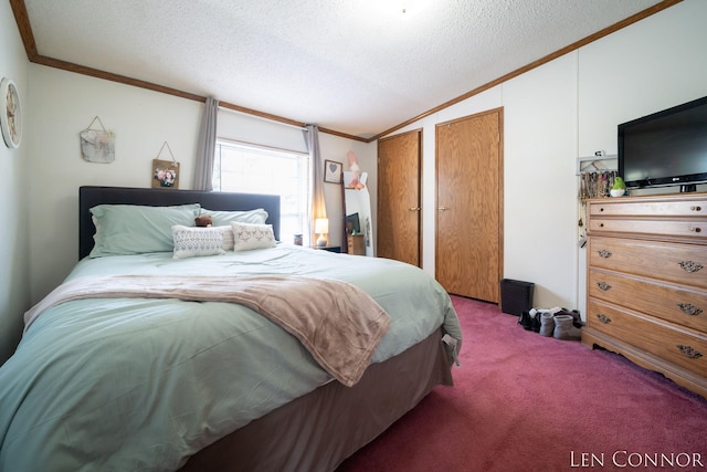 bedroom featuring lofted ceiling, ornamental molding, a textured ceiling, and carpet flooring