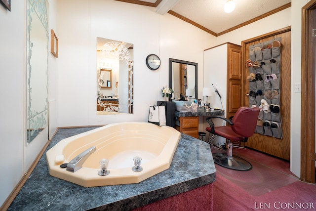 full bathroom featuring ornamental molding, lofted ceiling with beams, vanity, and a bath