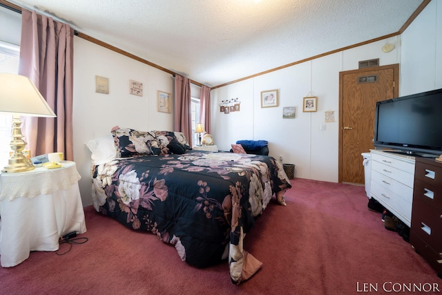 carpeted bedroom featuring ornamental molding, visible vents, and a textured ceiling