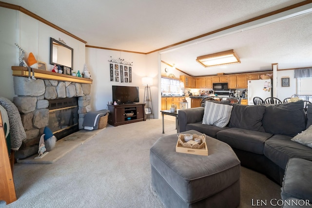 living area with a wealth of natural light, a fireplace, light colored carpet, and crown molding