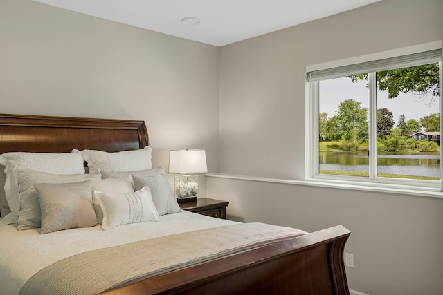 bedroom with a water view